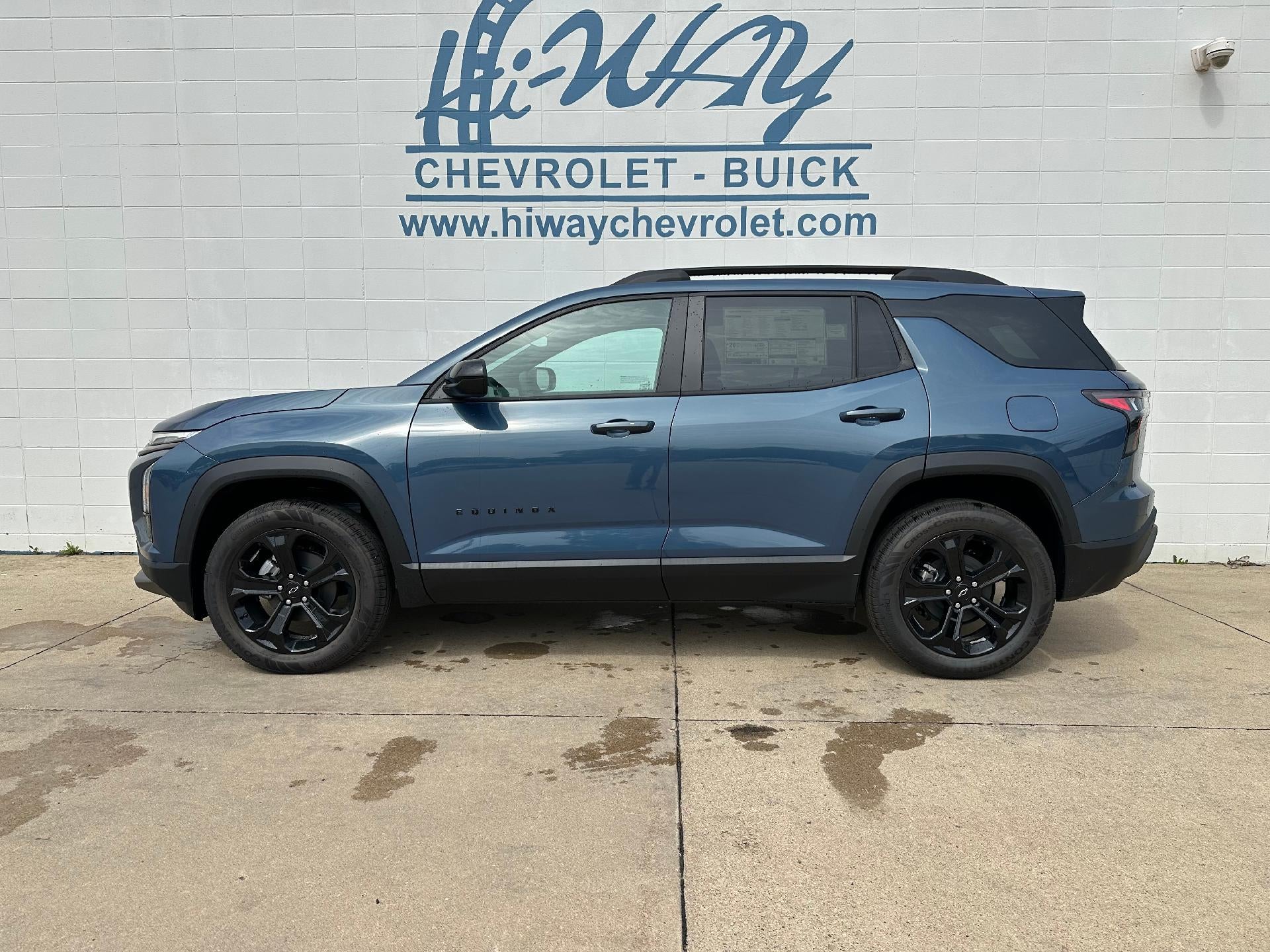 2026 Chevrolet Equinox AWD LT in Lakeshore Blue Metallic — front three-quarter view