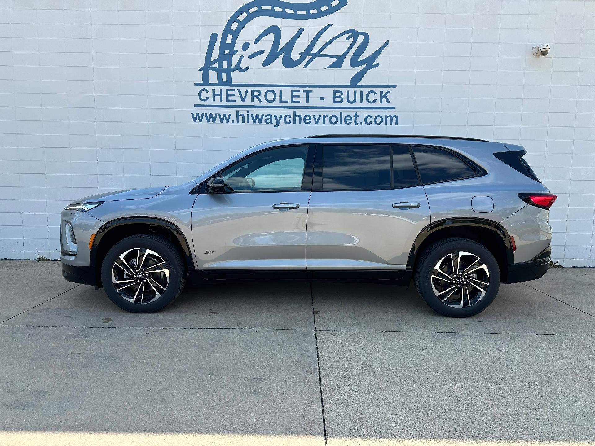 2026 Buick Enclave Sport Touring in Moonstone Gray Metallic — front three-quarter view