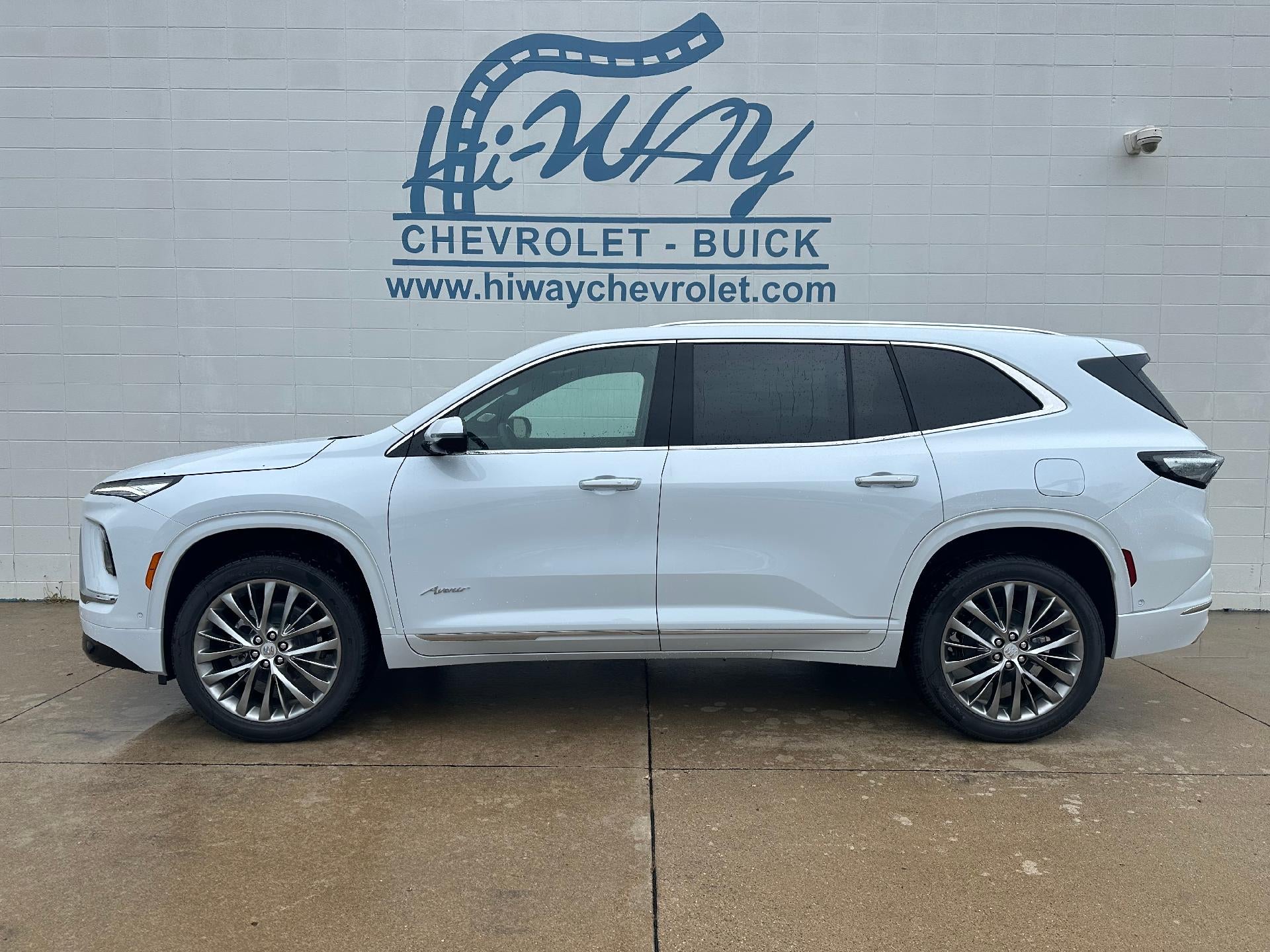 2026 Buick Enclave Avenir in Iridescent White Tricoat — front three-quarter view