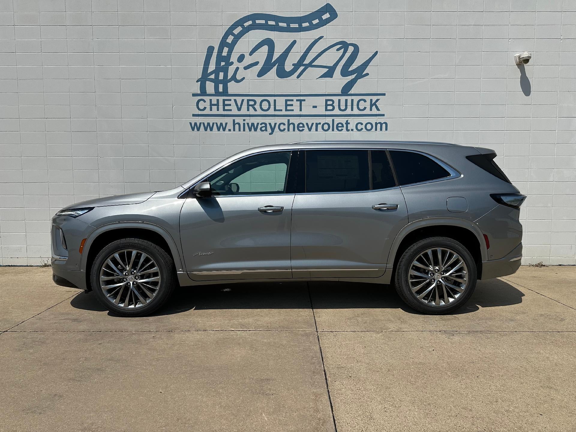 2026 Buick Enclave Avenir in Moonstone Gray Metallic — front three-quarter view