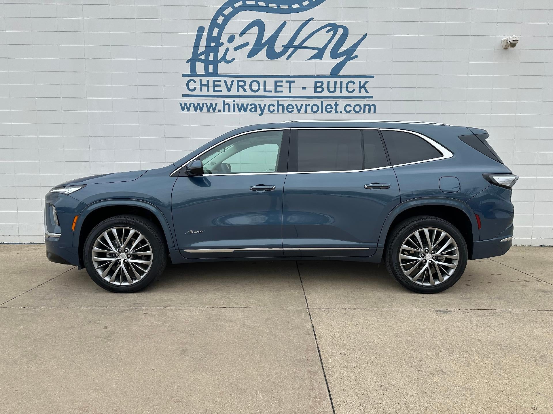 2025 Buick Enclave Avenir in Ocean Blue Metallic — front three-quarter view