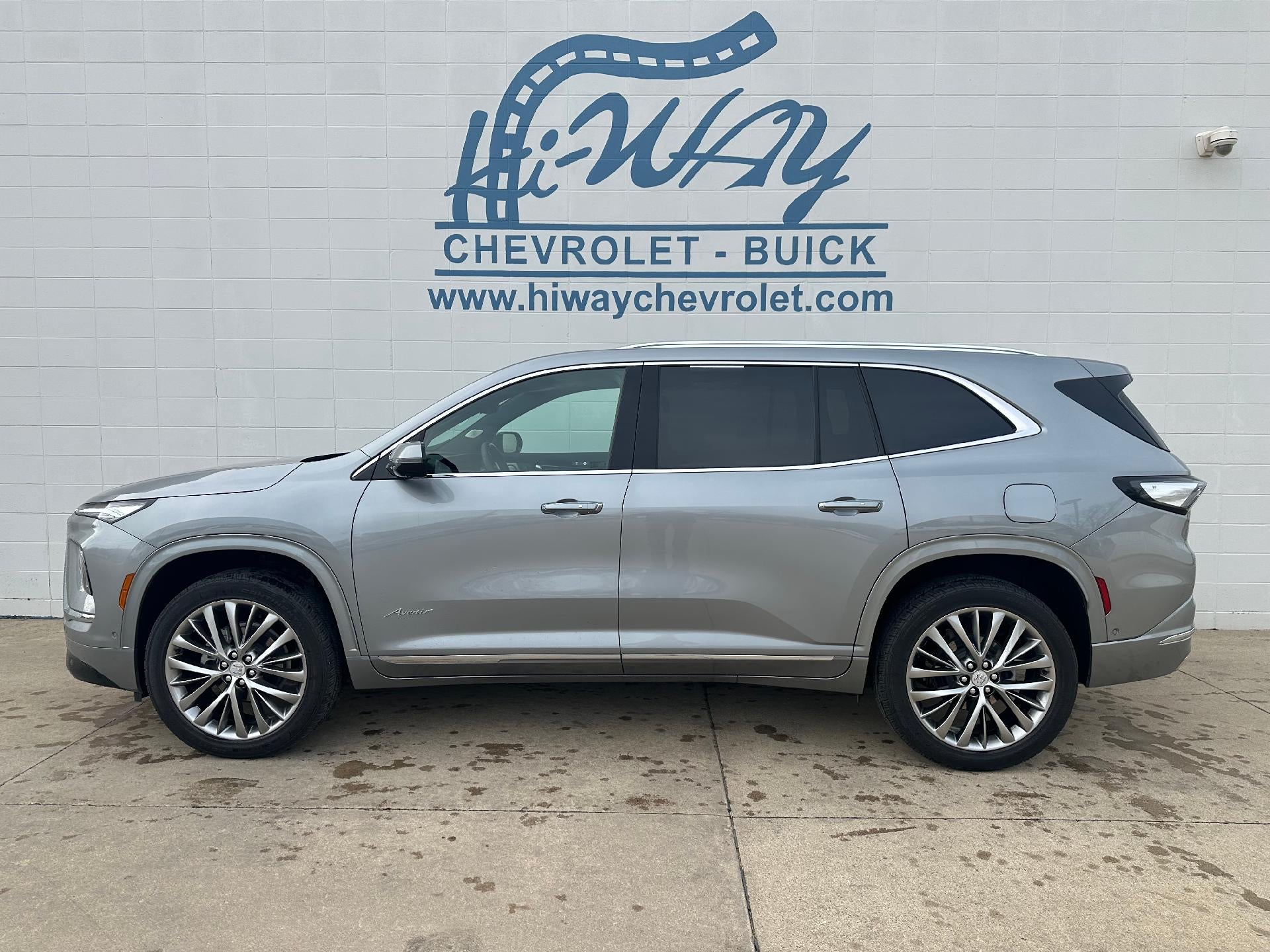 2025 Buick Enclave Avenir in Moonstone Gray Metallic — front three-quarter view