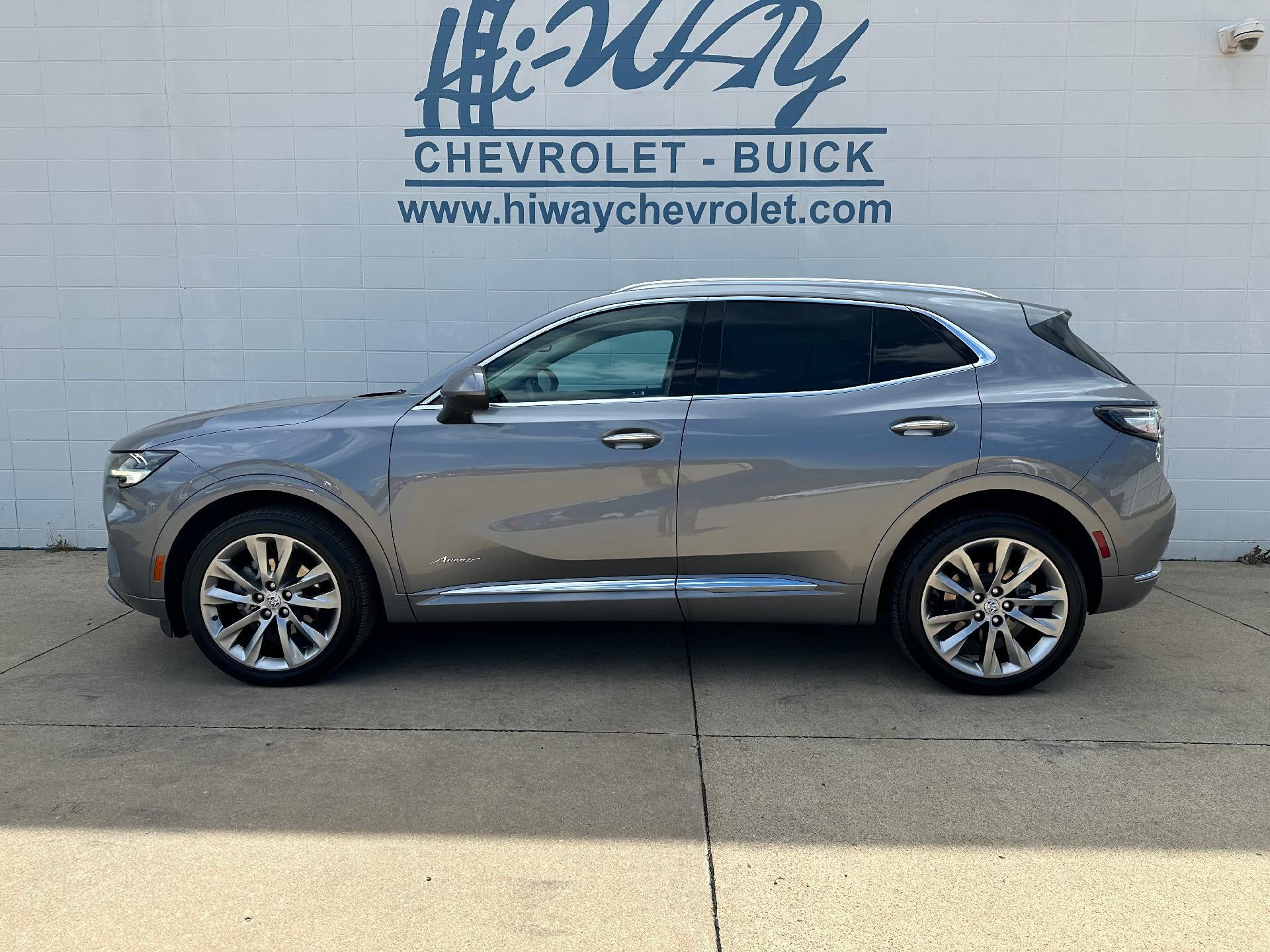2022 Buick Envision Avenir in Satin Steel Metallic — front three-quarter view